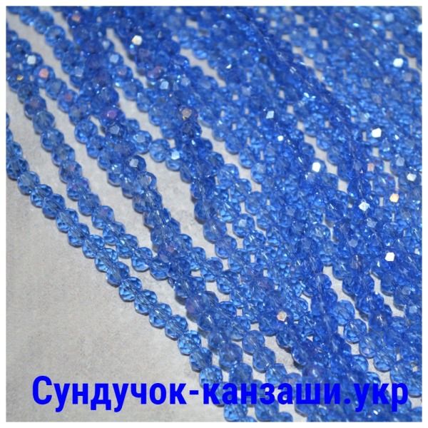 Грановані скляні намистини 3,6*4,5 мм, колір- голубий АВ ,1-нитка ≈125-130 шт 014045 фото