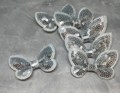 Бантик-метелик (паєтка), розмір 6*3,7 см, колір-срібло, шт 09035 фото